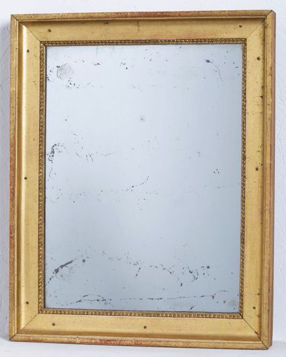 Miroir en bois doré. 
XIXème siècle. 
H_56...