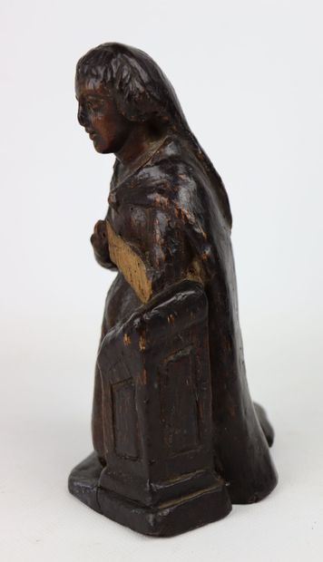 null Sainte en prière.

Sculpture en bois sculpté.

XVIIème siècle

H_20 cm P_15...