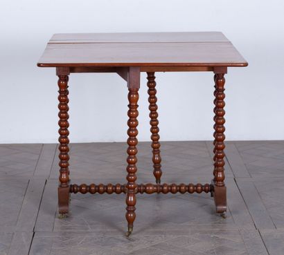 null Table à thé dite « gate-legs » en acajou et placage d'acajou.

XIXème siècle.

H_71.5...