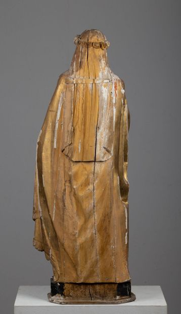 null Vierge en bois sculpté, polychrome et doré.

Vers 1800.

H_89 cm, accidents...
