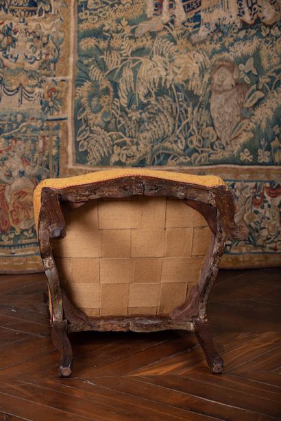  Chaise en bois mouluré et sculpté de coquilles et rinceaux. 
Epoque Régence. 
Garniture...