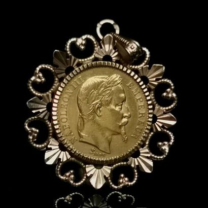 null Pièce de 20 francs or Napoléon III 1867 montée en pendentif.

9,34 grammes