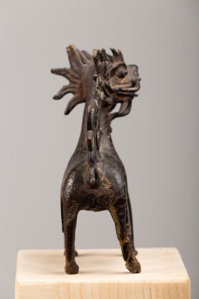 null CHINE

Chien de Phö en bronze, ancien.

H_17,3 cm L_17 cm