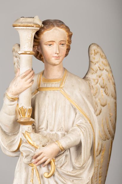 null Paire d'anges céroféraires en terre cuite polychrome.

XIXème siècle.

H_61...