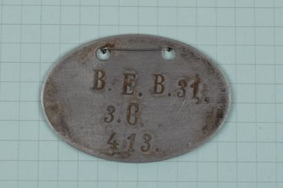 null Plaque d'identité allemande 1914-1918.
Plaque et fiche descriptive établie par...