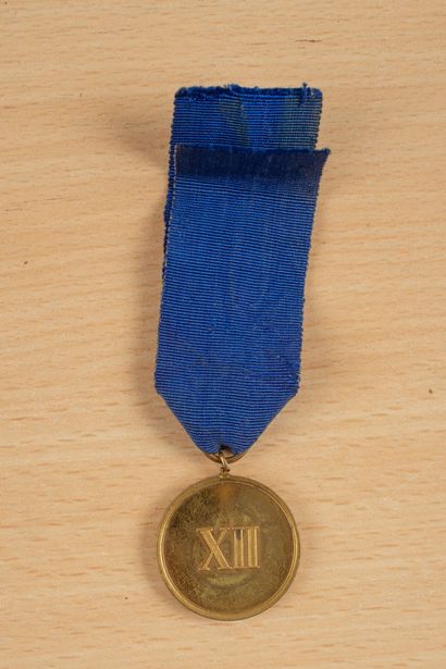 null Médaille pour 12 ans de service
Médaille pour 12 ans de service, avec son ruban....