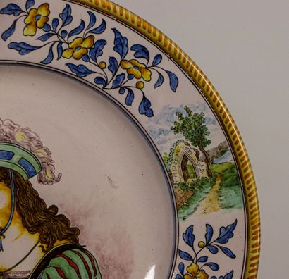 null NEVERS, Antoine MONTAGNON. 
Earthenware dish with the effigy of Joan of Arc....