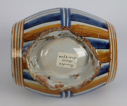 null NEVERS.
Earthenware barrel, decorated in blue and yellow-orange camaïeu, dated...