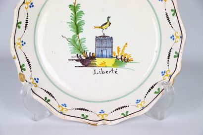 null NEVERS.
Earthenware plate with polychrome revolutionary decoration of a bird...