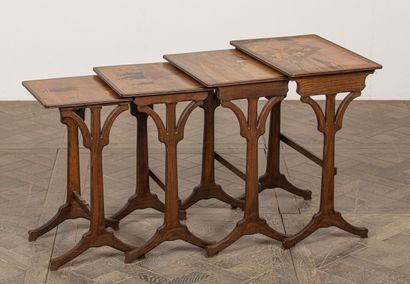 null Emile GALLE (1846-1904).
Suite de quatre tables gigogne "Bretagne" en hêtre...