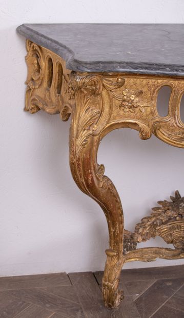 null Carved and gilded wood console decorated with shells, openwork, leaves and foliage,...