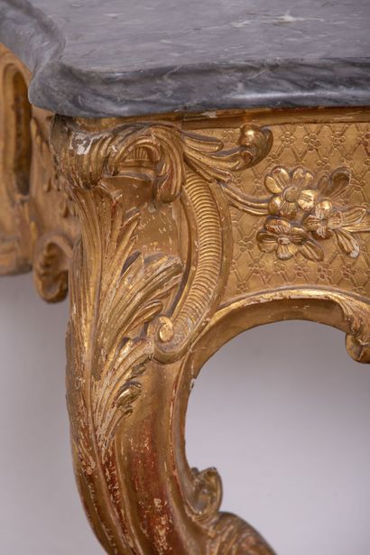 null Carved and gilded wood console decorated with shells, openwork, leaves and foliage,...