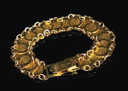 Bracelet en or jaune composé de vingt pièces...