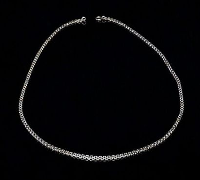 null Collier en or jaune à maille forçat.
L_52 cm.
15,74 grammes, 18K, 750°/00