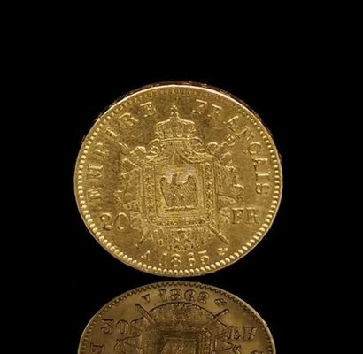 null Pièce 20 francs or Napoléon III, tête laurée.
1865 A.
6,45 grammes