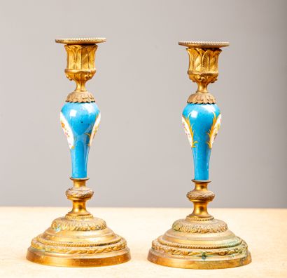 null SEVRES, in the taste of.
Pair of porcelain and gilt bronze candlesticks.
Second...