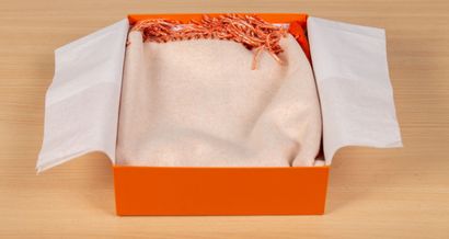 null HERMES Paris. 
Orange and beige cashmere stole (100%).
In its original box....