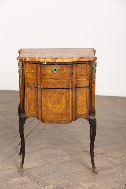 null Chest of drawers in marquetry of wood veneer, opening to two drawers.
It rests...