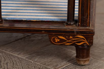 null Table with books in rosewood veneer and light wood marquetry. The base with...