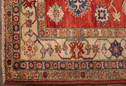 null Wool carpet KAZAKH with red background.
L_200 cm l_147 cm