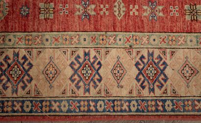 null KAZAKH carpet in wool with red background.
L_200 cm l_150 cm