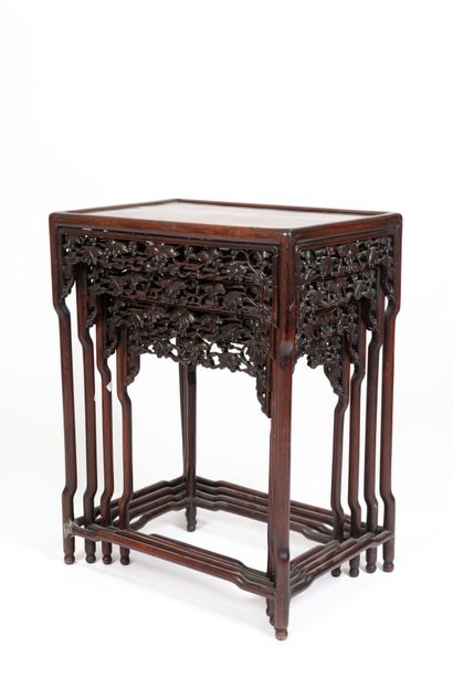 null CHINA, first half of the 20th century. 
Suite of four nesting tables in carved...