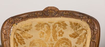null Pair of cabriolet armchairs in molded and carved wood, the belt decorated with...