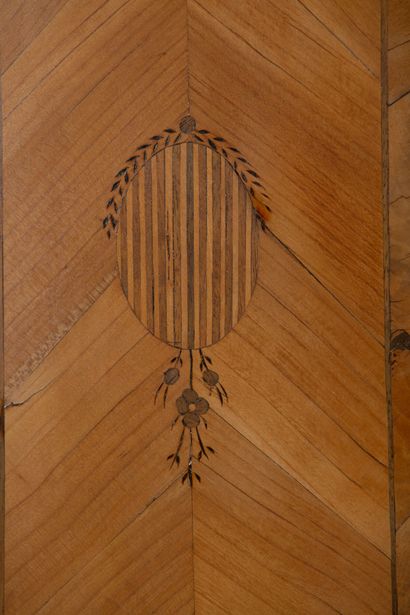 null Piece of furniture two bodies in marquetry of walnut and tinted wood, with decoration...