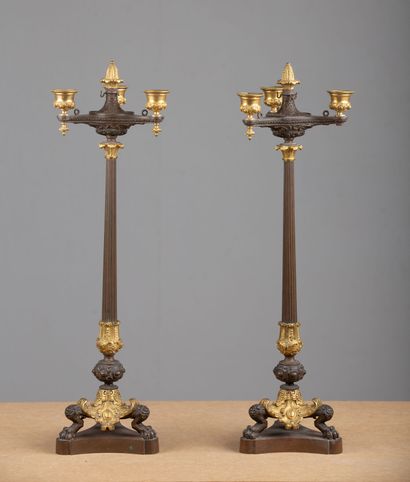 null Pair of large candelabras in brown patina bronze and gilt bronze.
Restoration...