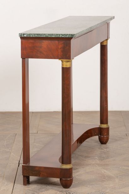 null Mahogany and mahogany veneer console with gilt bronze ornamentation.
It opens...