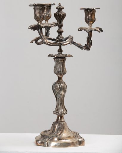 null Pair of silver plated bronze candelabras with three lights.
XVIIIth century.
H_42,5...