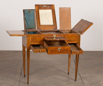 null Dressing table in marquetry of wood veneer.
Louis XVI period.
H_73 cm W_76 cm...