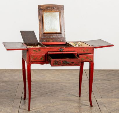 null Black and gold lacquered wood dressing table on a red background, with Chinese...