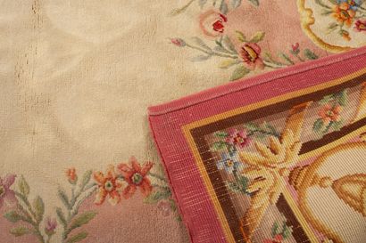 null AUBUSSON.
Polychrome wool carpet of Louis XVI style.
L_348 cm l_204 cm, sta...