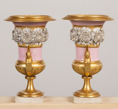 null PARIS, 
Pair of porcelain and cookie vases, pale pink background and gilding.
They...