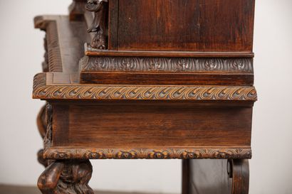 null Cabinet furniture with two bodies in richly carved walnut.
It opens with two...