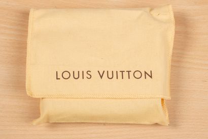 null Louis VUITTON, Paris. 
Purse with gusset, in ivory leather. 
In its original...