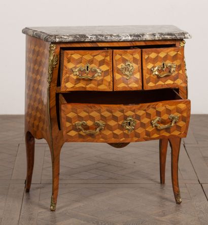 null Narrow chest of drawers in marquetry of checkerboards and ornamentation of gilt...