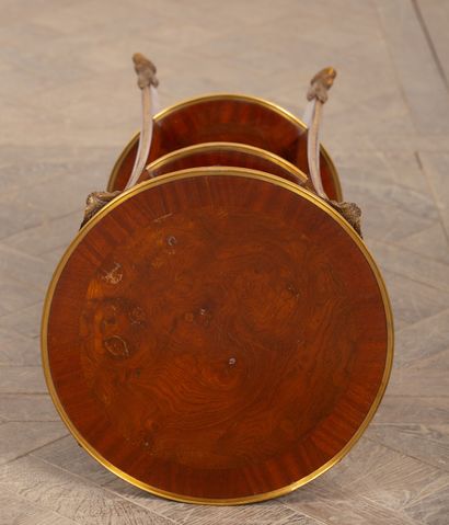 null Pedestal table in rosewood veneer and gilt bronze ornamentation with ram heads.
Louis...