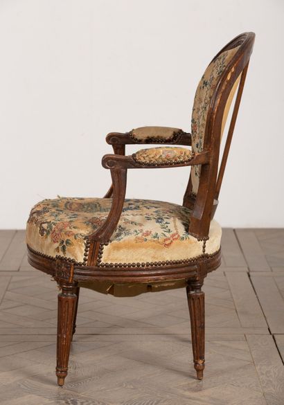 null Armchair in molded and carved wood.
Louis XVI period.
Upholstered with antique...