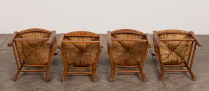 null Suite of four chairs with openwork backs decorated with architectures.
Directoire...