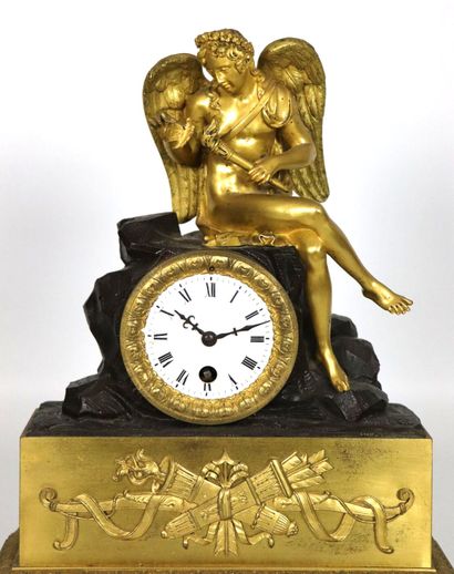 null Gilt bronze and brown patina bronze clock featuring Love approaching a butterfly...