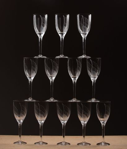 null LALIQUE France.
Suite of twelve champagne flutes model "Ange au sourire" - created...