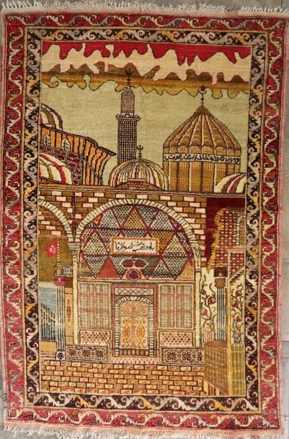 null TURKEY.
Woolen Konya carpet decorated with the mosque and the tomb of the scholar...