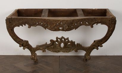 null Unusually low console in carved and openwork wood, formerly lacquered or gilded.
The...