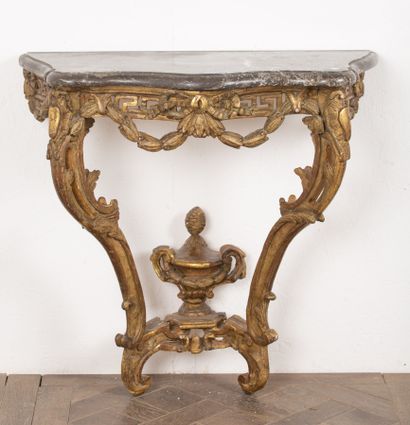 Carved and gilded wood console, friezes of...