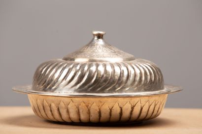 null CHRISTOFLE.
Covered semolina dish in silver plated metal, in the manner of the...