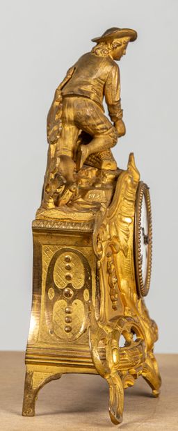 null Romantic clock in gilt bronze, featuring a young peasant collecting vegetables.
White...