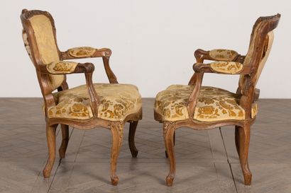 null Pair of cabriolet armchairs in molded and carved wood, the belt decorated with...
