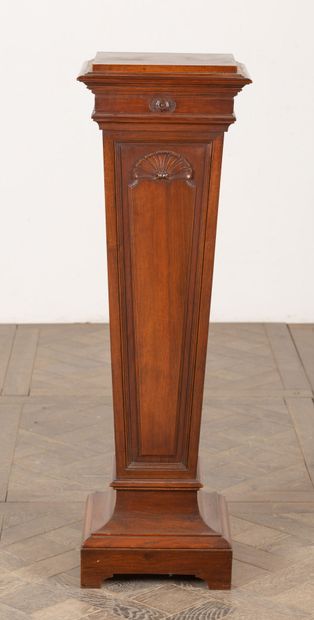 null A molded and carved walnut saddle with a draped love in the front.
End of the...